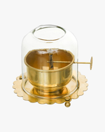 Sacred Akhand Jyot brass oil lamp with a steady flame inside a glass cover, symbolizing devotion and spiritual light
