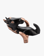 Modern horse-shaped key holder in black metal with copper accents, stylish wall-mounted key organizer