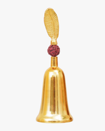 Gold-plated decorative bell with a red rudraksha bead and a leaf-shaped handle on top