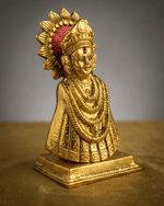Handcrafted golden metallic Lord Vitthal bust idol on a square pedestal, featuring intricate traditional jewelry and a sunburst halo design for home decor and pooja rooms