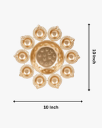 A circular arrangement of glowing golden diyas surrounding a bowl filled with red rose petals and a central candle, creating a warm festive decoration for Diwali. 🪔🌹✨