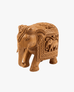 Decorative hand-carved wood elephant figurine crafted by Indian artisans