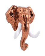 A three-quarter perspective view of the glossy copper elephant head key holder with curved white tusks, set against a dark black background