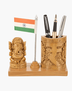 Front view of handcrafted wooden pen holder with embossed Rupee symbol, Ganesha statue, and Indian flag holding three pens.