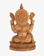 Hand carved wooden Lord Ganesha idol with detailed traditional design