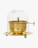 Side view of brass Akhand Jyot diya with glass cover for temple and home decor