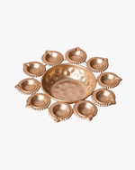 Brass urli with 12 diya holders decorative bowl for Diwali and home decor