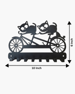 Dimension chart showing 10 inch width and 6 inch height for the black metal tandem cycle cats wall key stand.