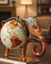 Traditional Indian-style metal elephant world globe showpiece with intricate colorful engravings and a copper-finish base