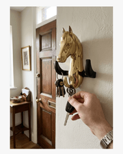 Front view of gold horse head wall hook key holder for home decor