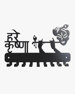 Decorative Hare Krishna wall mounted key holder with multiple hooks holding house keys