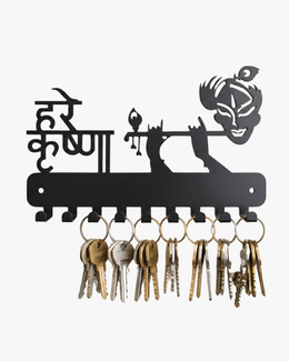 Black metal Hare Krishna key holder for wall with 7 hooks holding multiple sets of keys