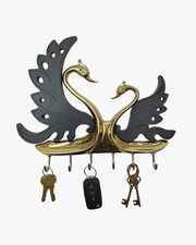 Stylish swan key holder with multiple hooks holding keys ideal for home wall organization