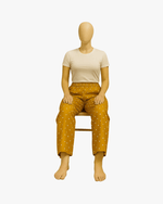 Golden women’s palazzo pants with traditional Rajasthani style
