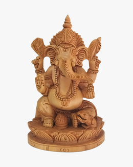 Hand carved wooden Lord Ganesha idol with detailed traditional design