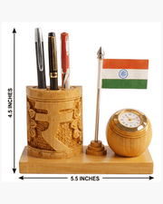 Handcrafted wooden pen stand with Indian flag and clock showing dimensions 5.5 by 4.5 inches